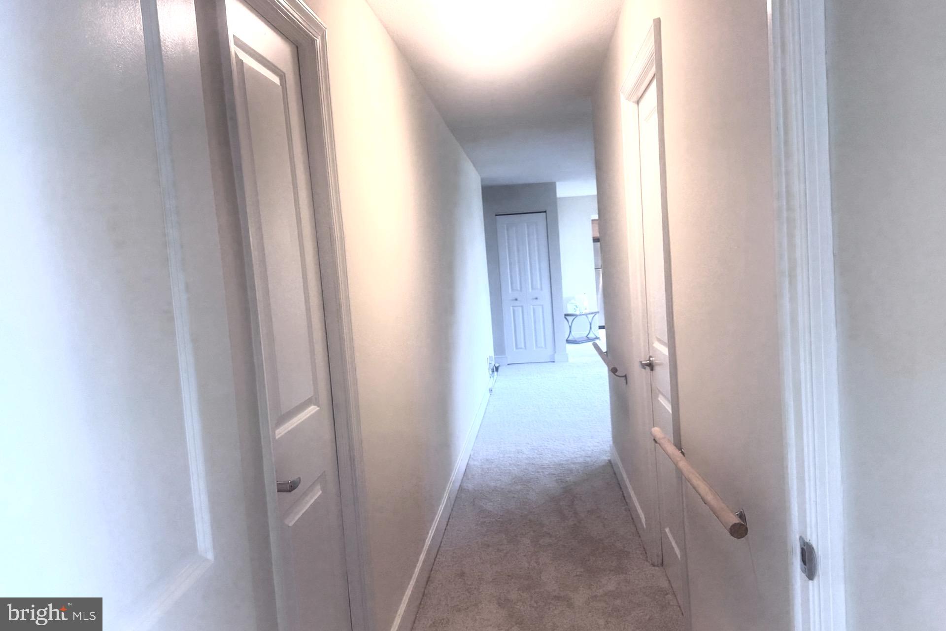 1220 Blair Mill Road, Unit 405 Silver Spring, MD 20910 - Photo 15 of 39 a view of a hallway with a hallway