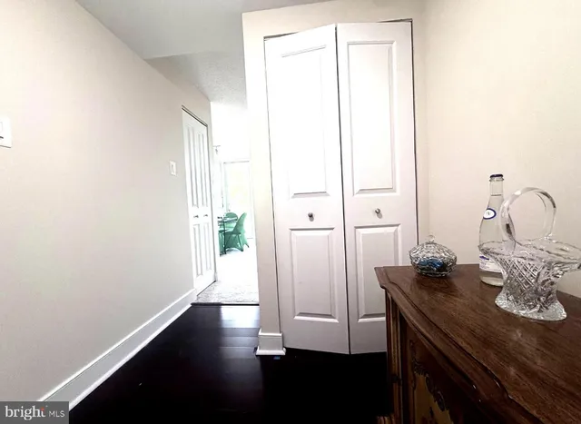 a view of a bathroom sink and a window