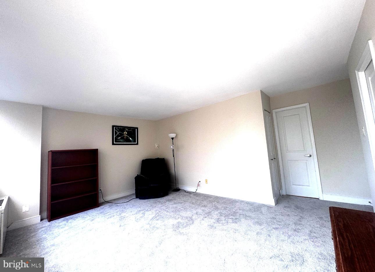1220 Blair Mill Road, Unit 405 Silver Spring, MD 20910 - Photo 26 of 39 a view of empty room with closet and cabinet