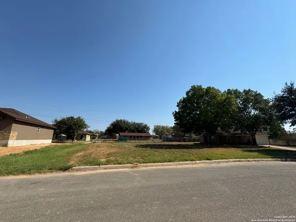 a view of swimming pool with an outdoor space and seating area