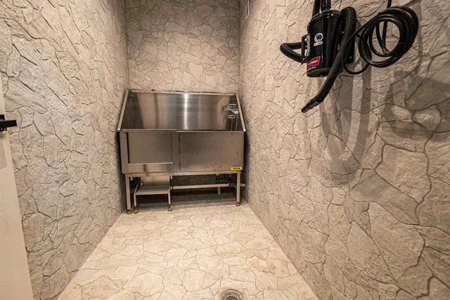 a bathroom with a toilet and a sink