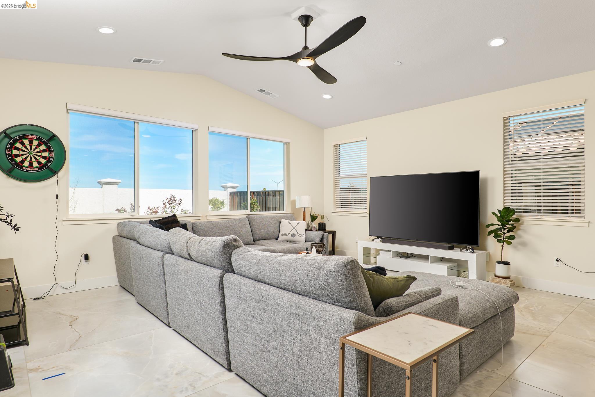 5532 Promontory Way Antioch, CA 94531 - Photo 12 of 45 Living area featuring ceiling fan, recessed lighting, and lofted ceiling