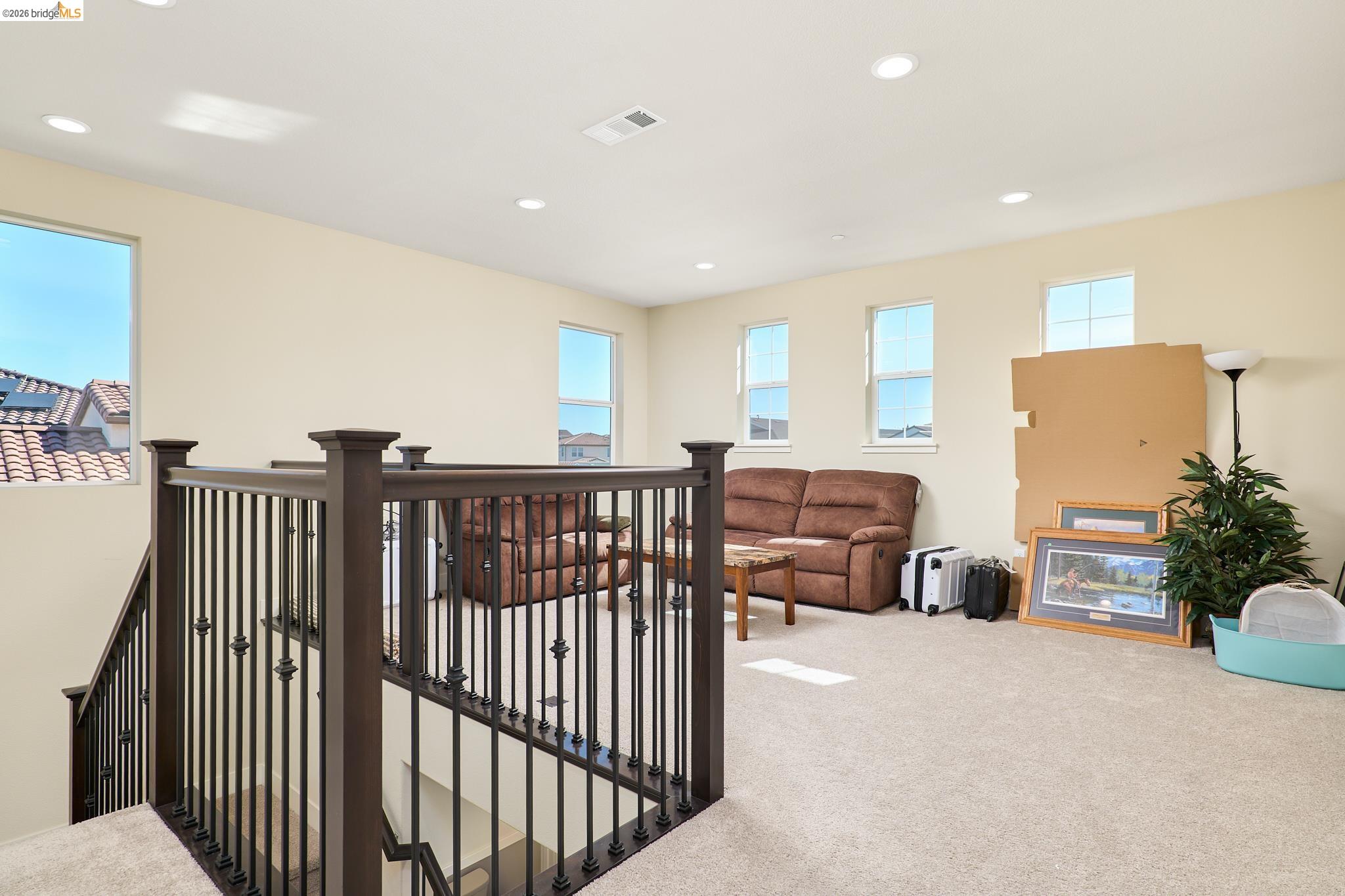 5532 Promontory Way Antioch, CA 94531 - Photo 13 of 45 Corridor featuring recessed lighting, carpet flooring, healthy amount of natural light, and an upstairs landing