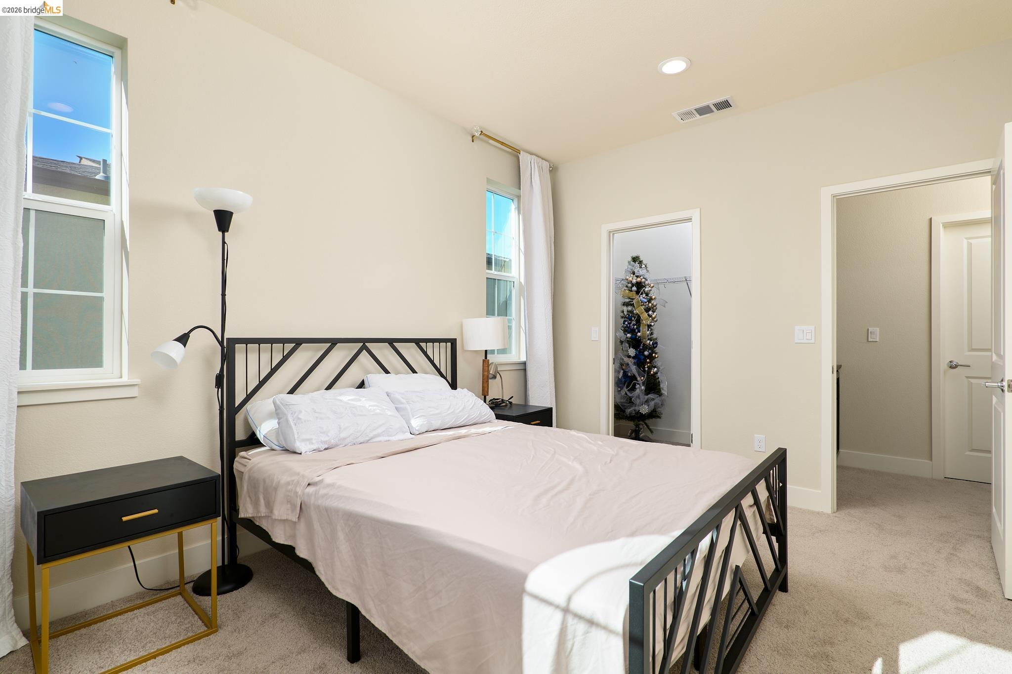 5532 Promontory Way Antioch, CA 94531 - Photo 20 of 45 Bedroom featuring light carpet, a spacious closet, and recessed lighting