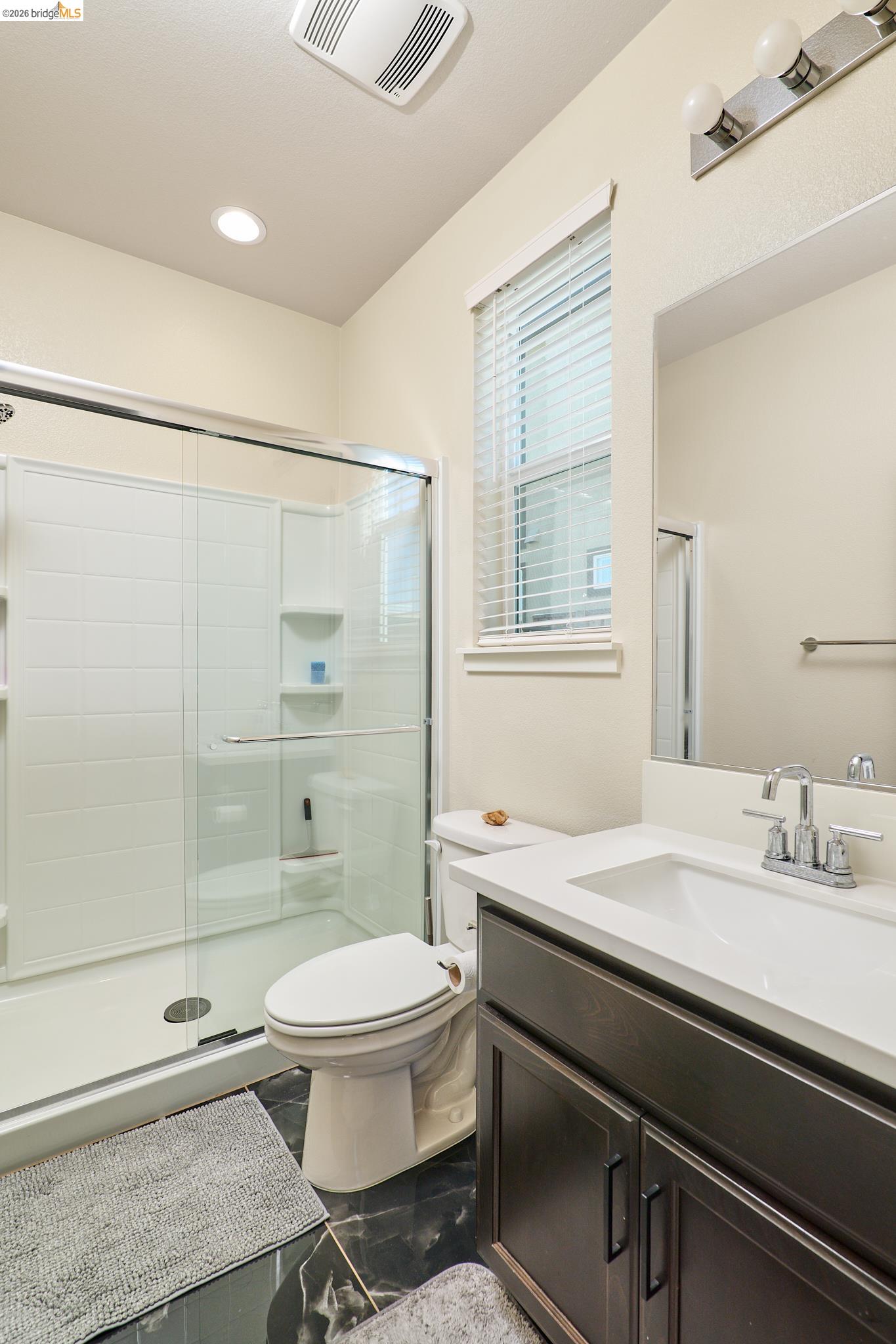 5532 Promontory Way Antioch, CA 94531 - Photo 30 of 45 Full bathroom with vanity, a stall shower, and recessed lighting