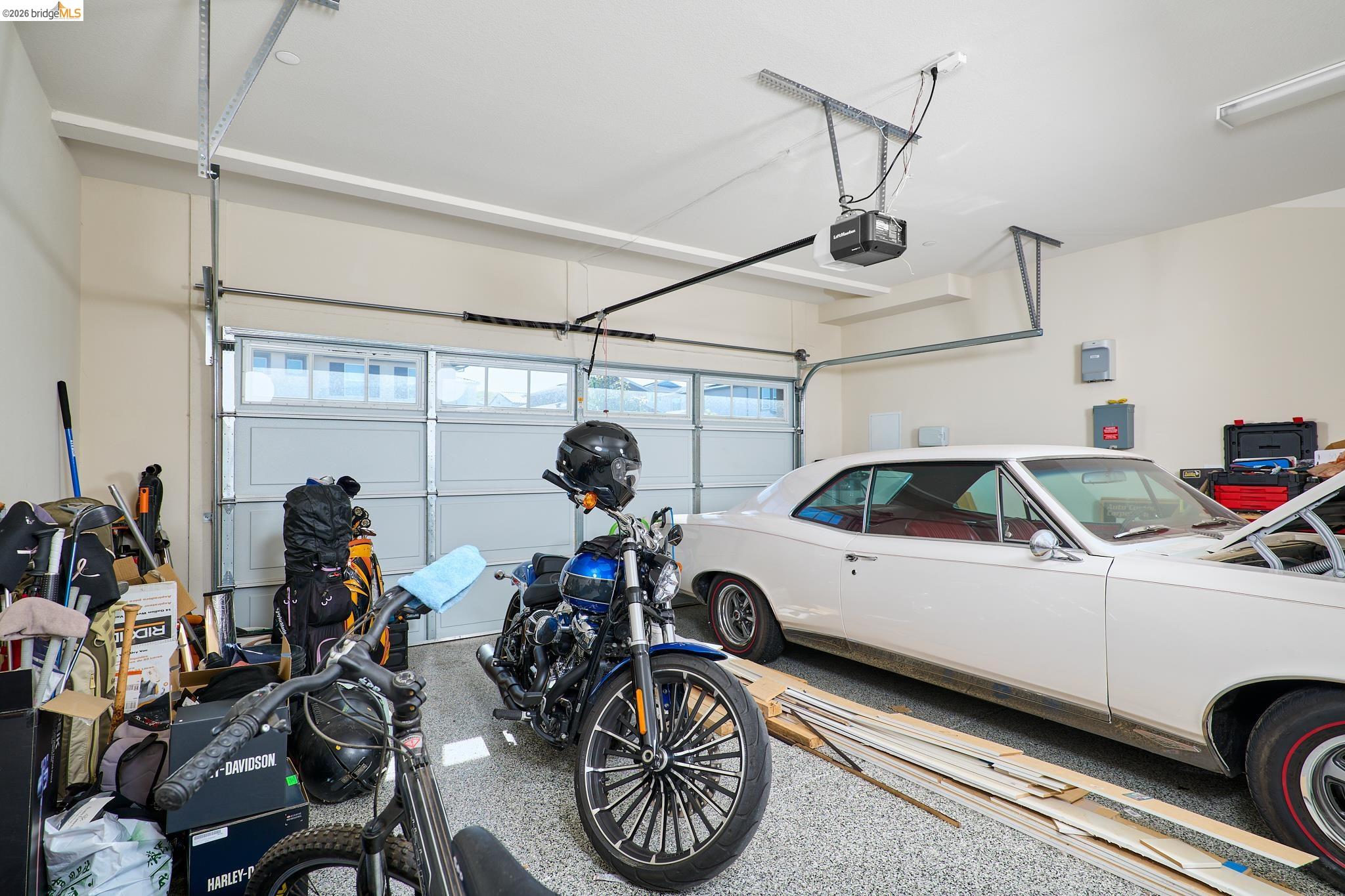 5532 Promontory Way Antioch, CA 94531 - Photo 32 of 45 Garage featuring electric panel and a garage door opener
