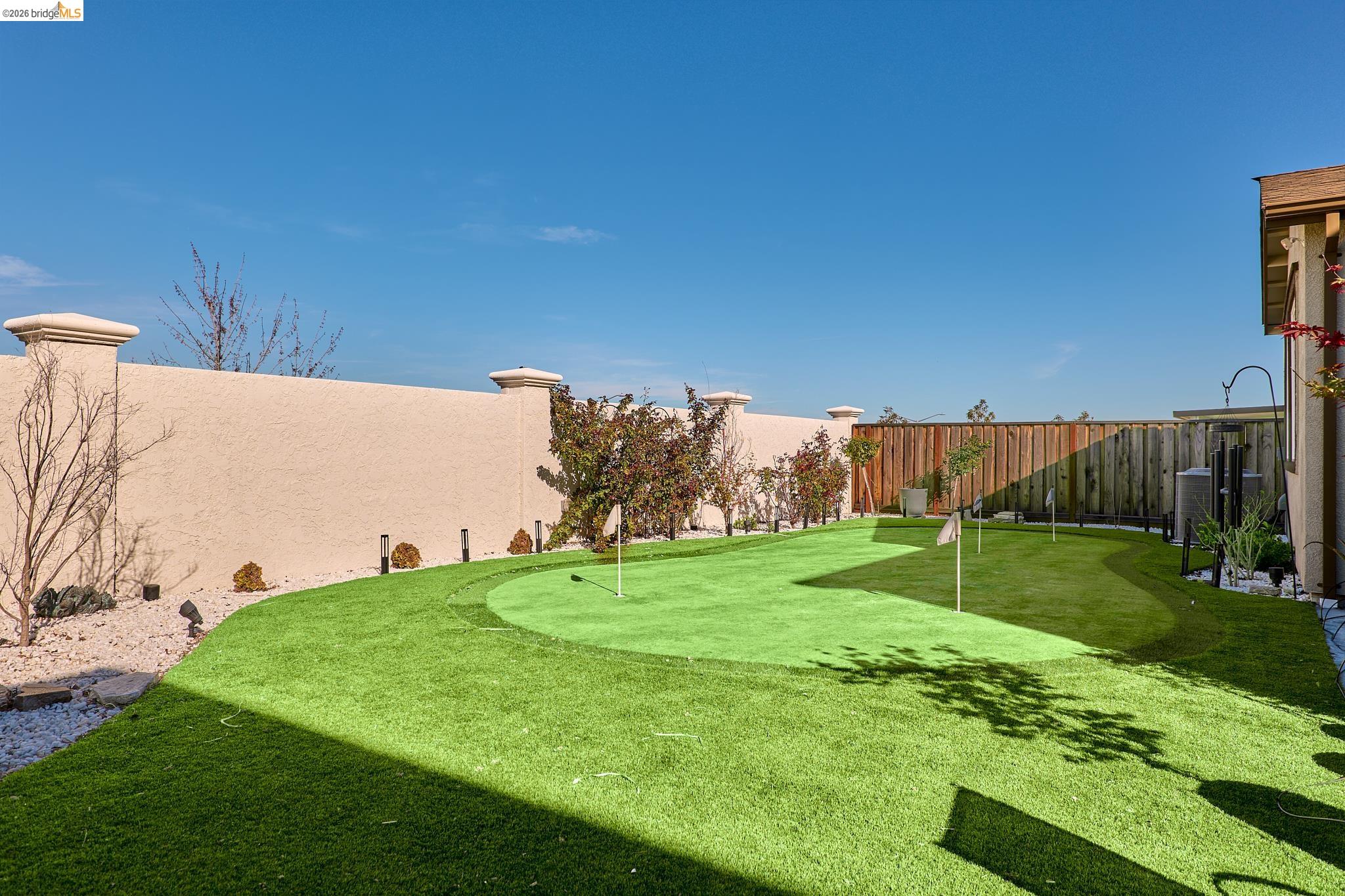 5532 Promontory Way Antioch, CA 94531 - Photo 41 of 45 Fenced backyard featuring a putting green