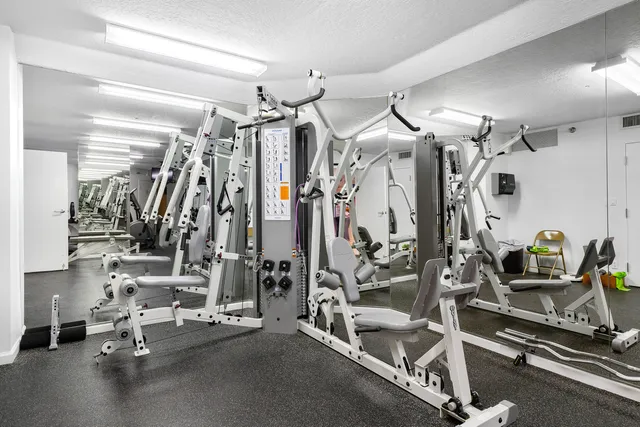 a view of a room with gym equipment