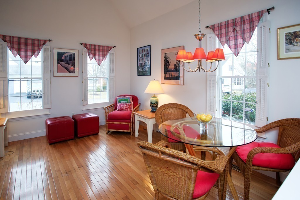 51 Stratford Ridge, Unit 152 Mashpee, MA 02649 - Photo 12 of 28 a living room with furniture toys and a window