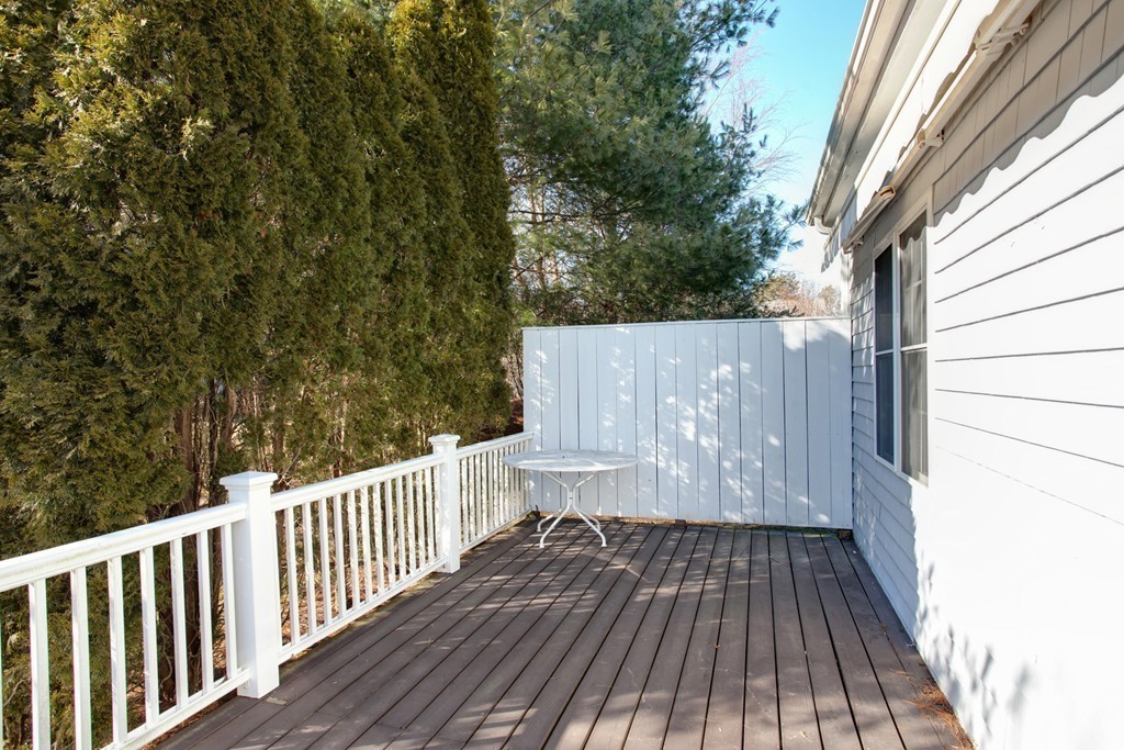 51 Stratford Ridge, Unit 152 Mashpee, MA 02649 - Photo 23 of 28 a view of outdoor space with deck and yard