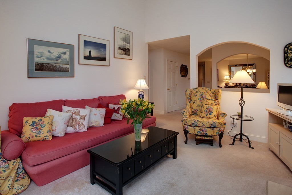 51 Stratford Ridge, Unit 152 Mashpee, MA 02649 - Photo 8 of 28 a living room with furniture