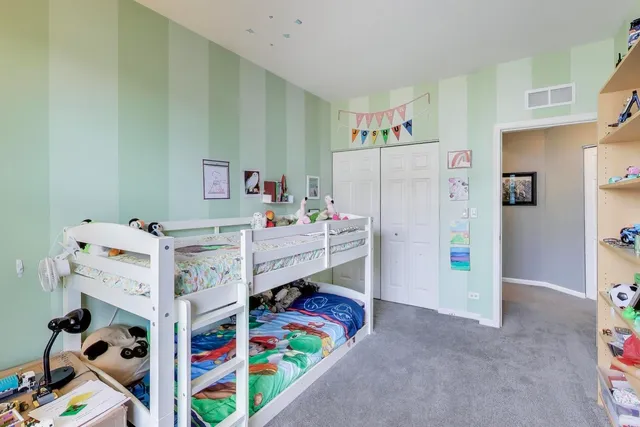 a room with toys and a baby crib