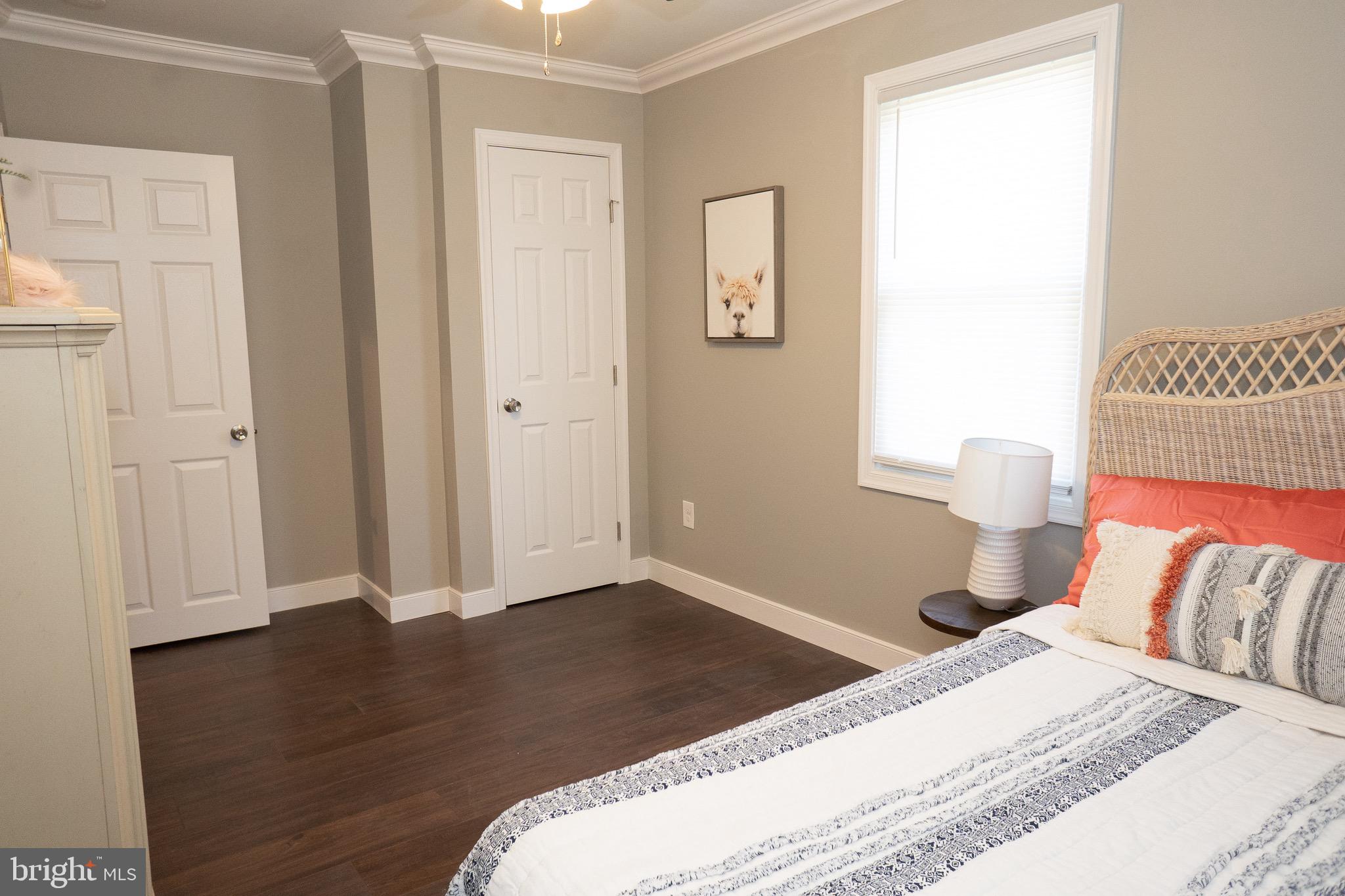915 Martin Road Baltimore, MD 21221 - Photo 10 of 34 Main Level Bedroom w/ Ceiling Fan