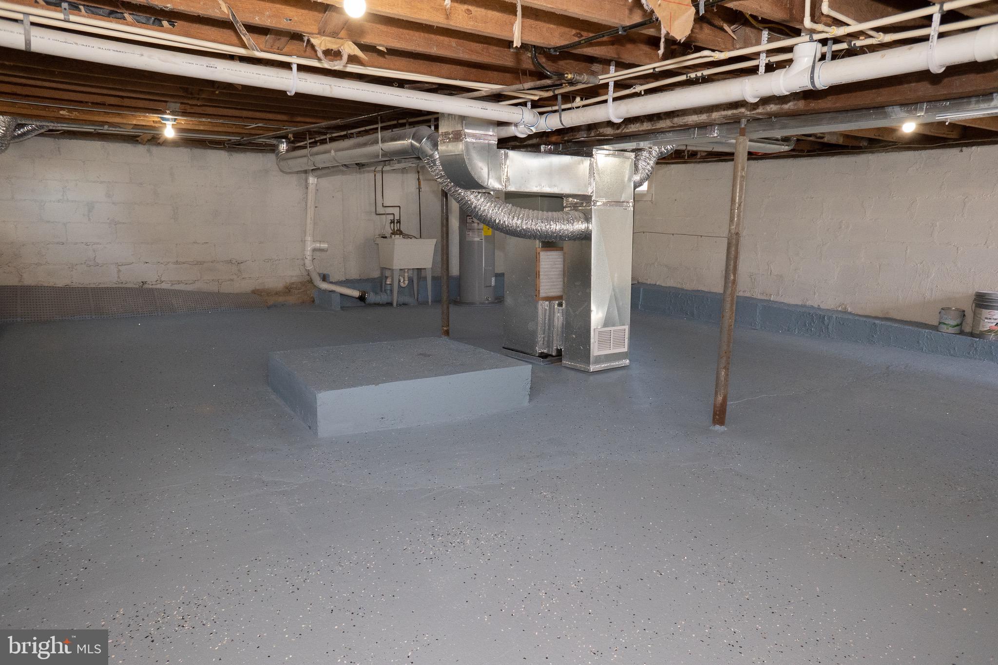 915 Martin Road Baltimore, MD 21221 - Photo 20 of 34 New Cement Floor & Water Proofed w/ Sump Pump