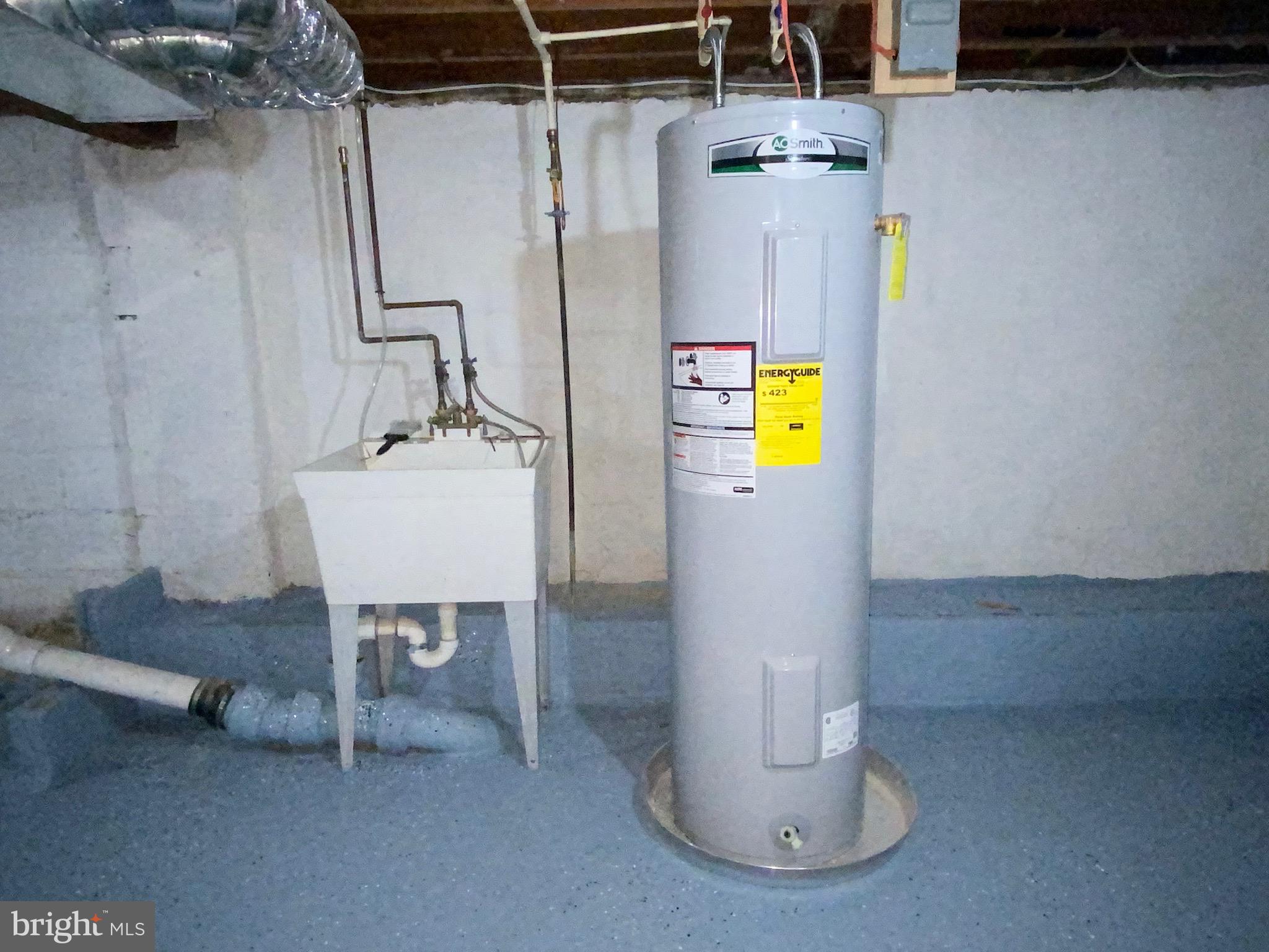 915 Martin Road Baltimore, MD 21221 - Photo 32 of 34 New Hot Water Heater & Laundry Tub