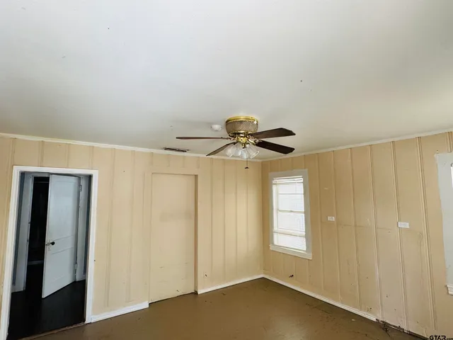 a view of an empty room and window
