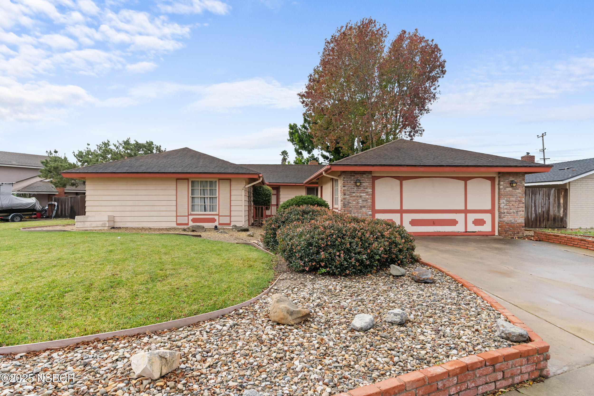 4200 Rigel Avenue Lompoc, CA 93436 - Photo 1 of 4 a front view of a house with garden