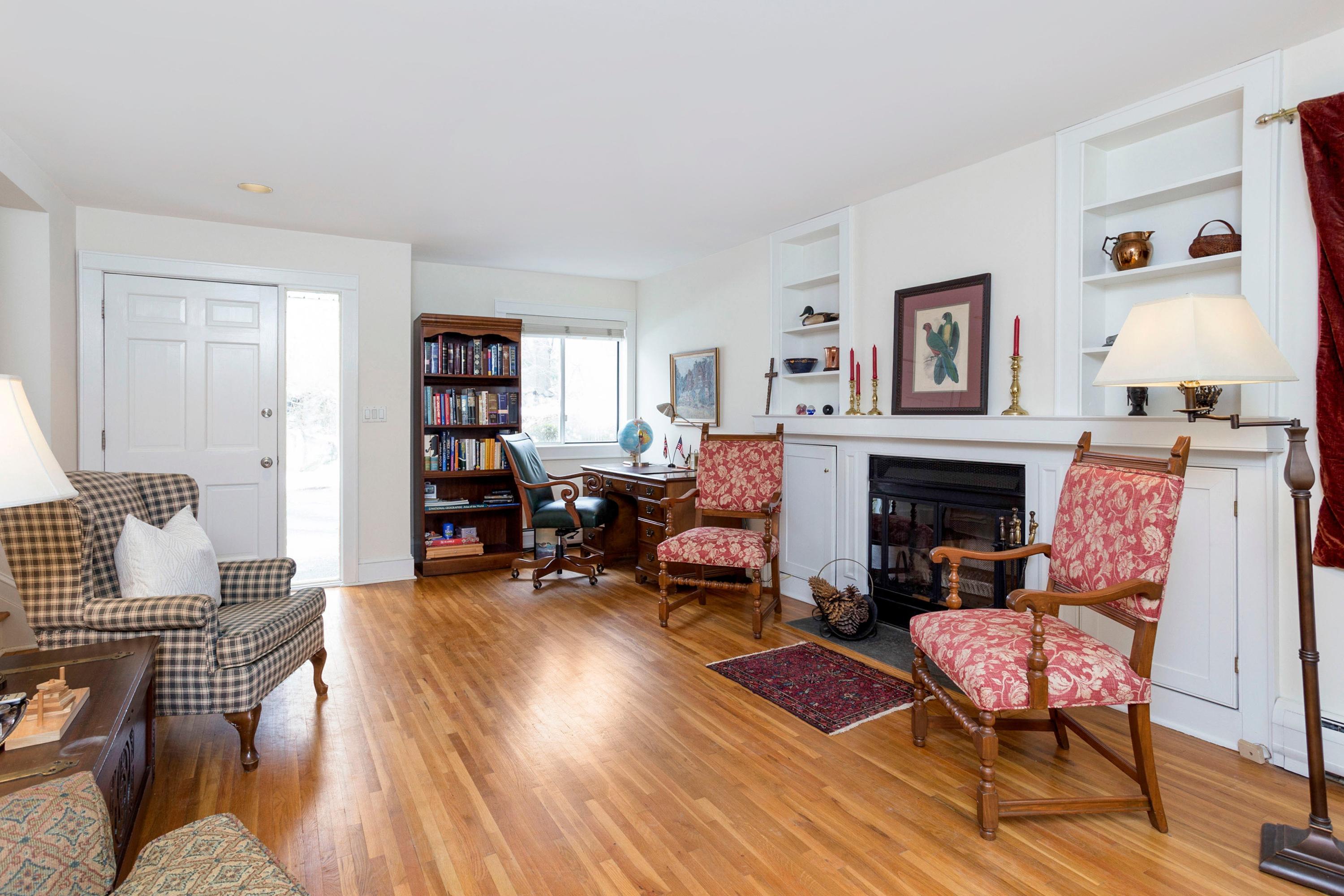 6 Locust Hill Road Darien, CT 06820 - Photo 3 of 18 a living room with furniture and a fireplace