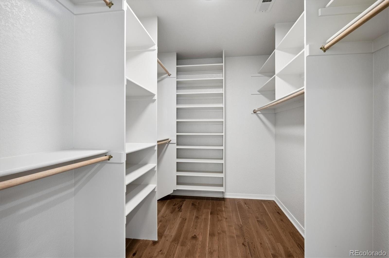 167 South Rogers Way Golden, CO 80401 - Photo 26 of 50 a view of walk in closet with empty racks