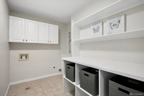 a living room with furniture and white table