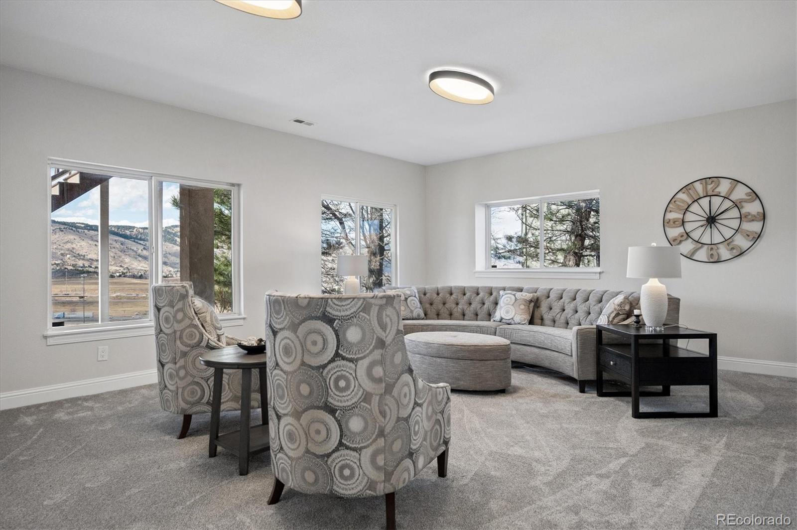167 South Rogers Way Golden, CO 80401 - Photo 40 of 50 a living room with furniture and a large window