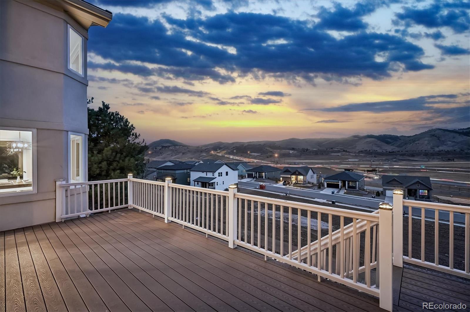 167 South Rogers Way Golden, CO 80401 - Photo 43 of 50 a view of a balcony with wooden floor