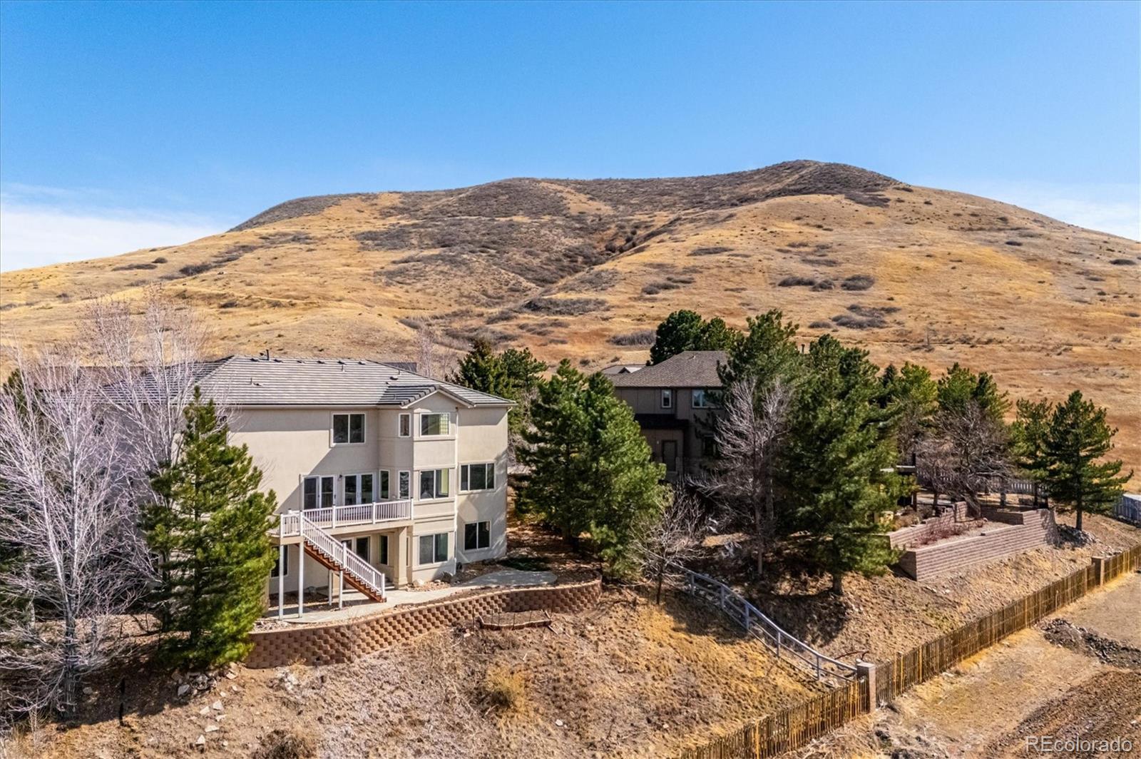 167 South Rogers Way Golden, CO 80401 - Photo 47 of 50 a view of a house with a mountain in the background