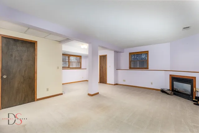 an empty room with windows