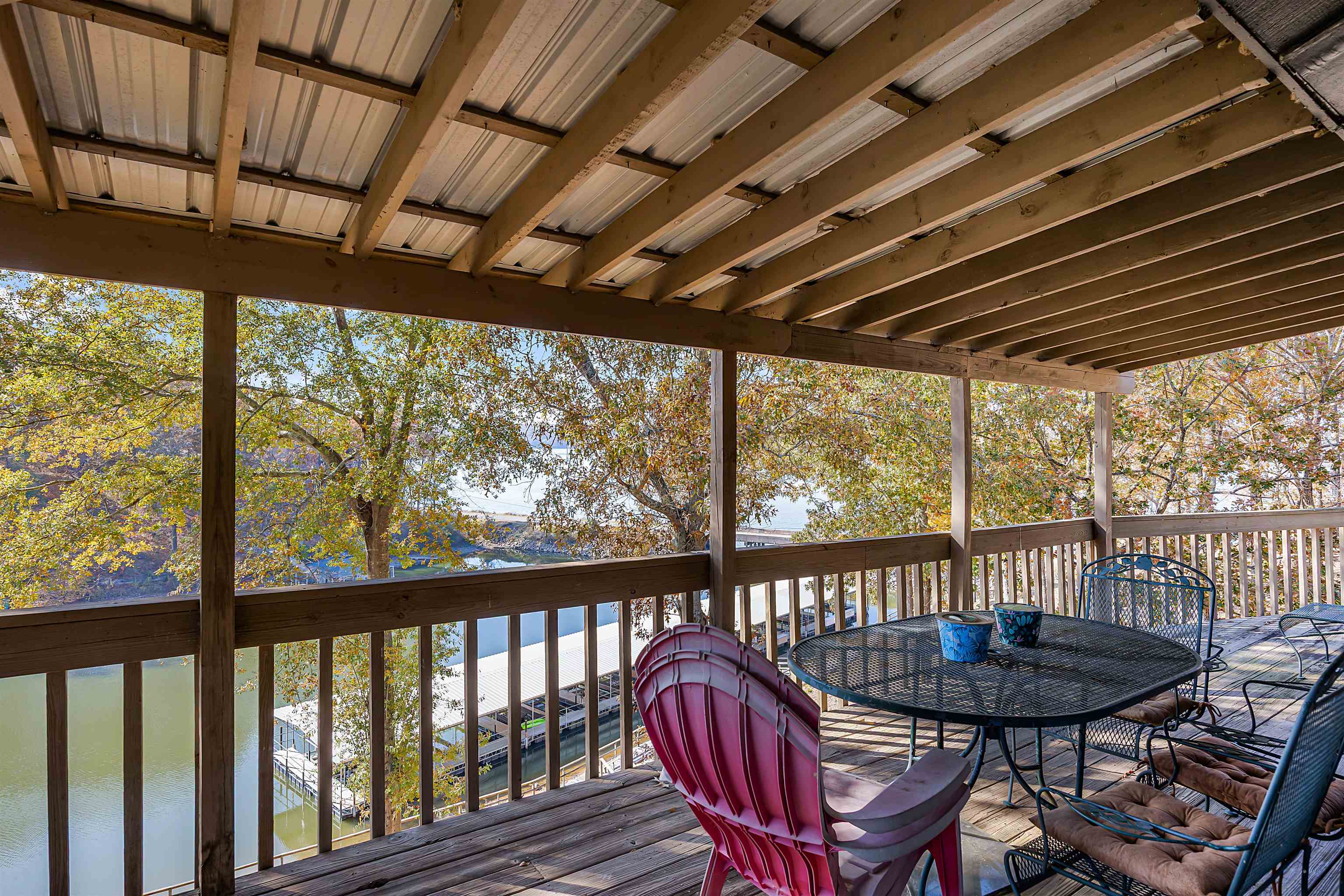 80 Riviera Cove Cherokee, AL 35616 - Photo 27 of 31 Wooden terrace with outdoor dining area and a water view