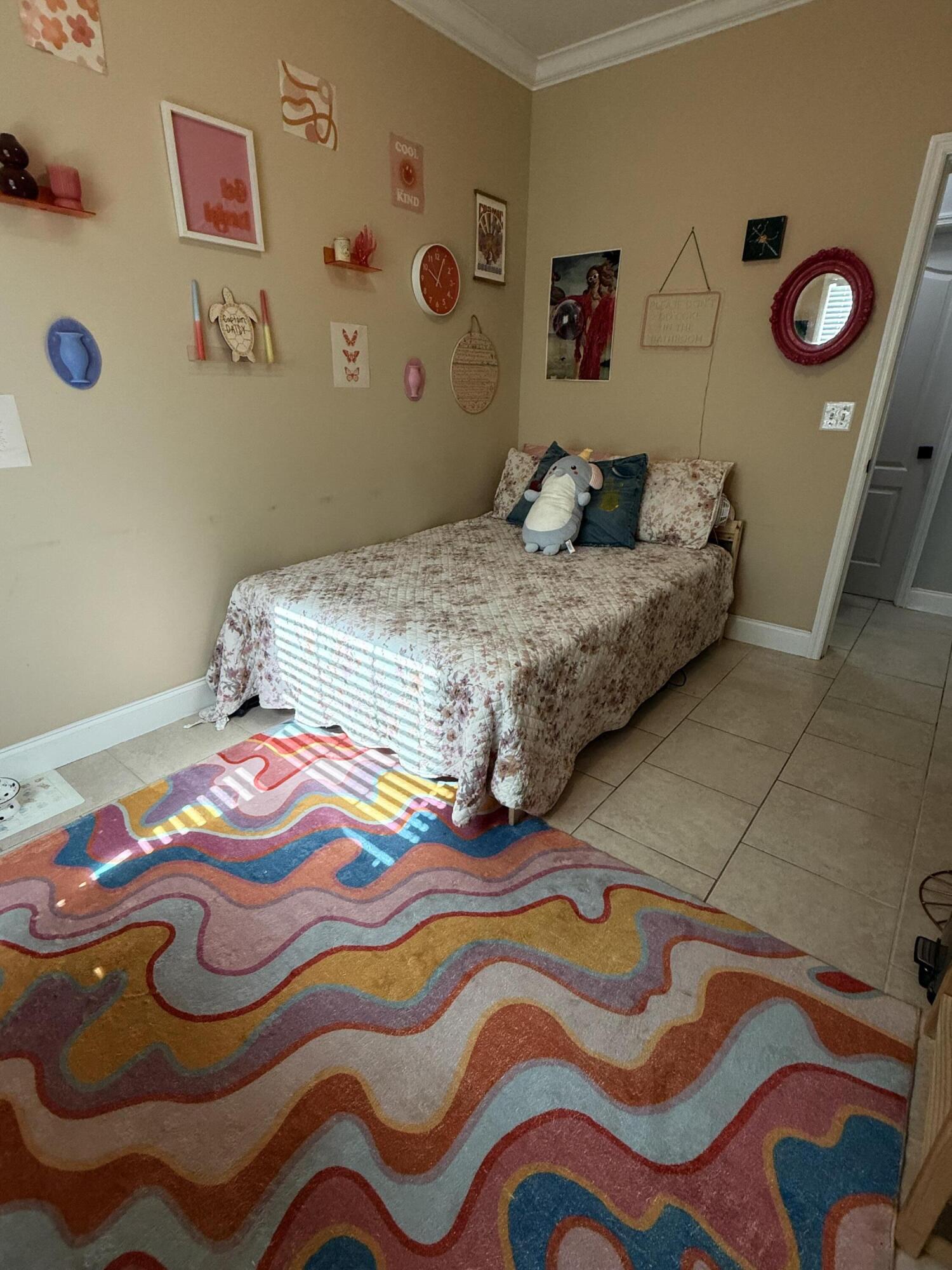 314 Ave D Key West, FL 33040 - Photo 13 of 23 a bedroom with a bed and a wooden floor