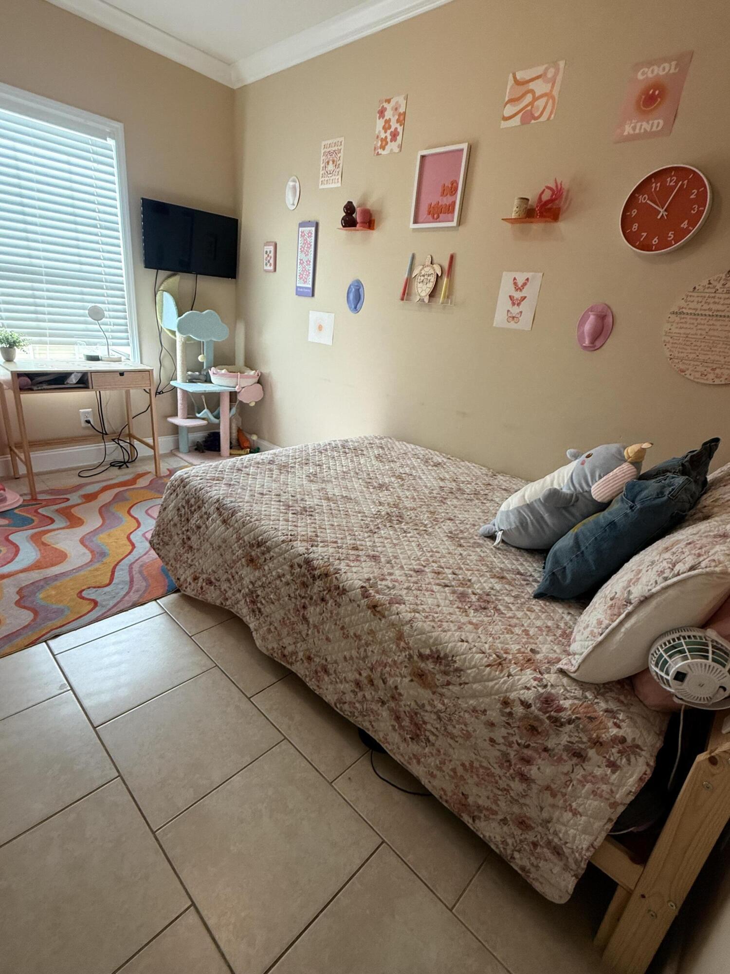 314 Ave D Key West, FL 33040 - Photo 14 of 23 a bedroom with a bed and a couch