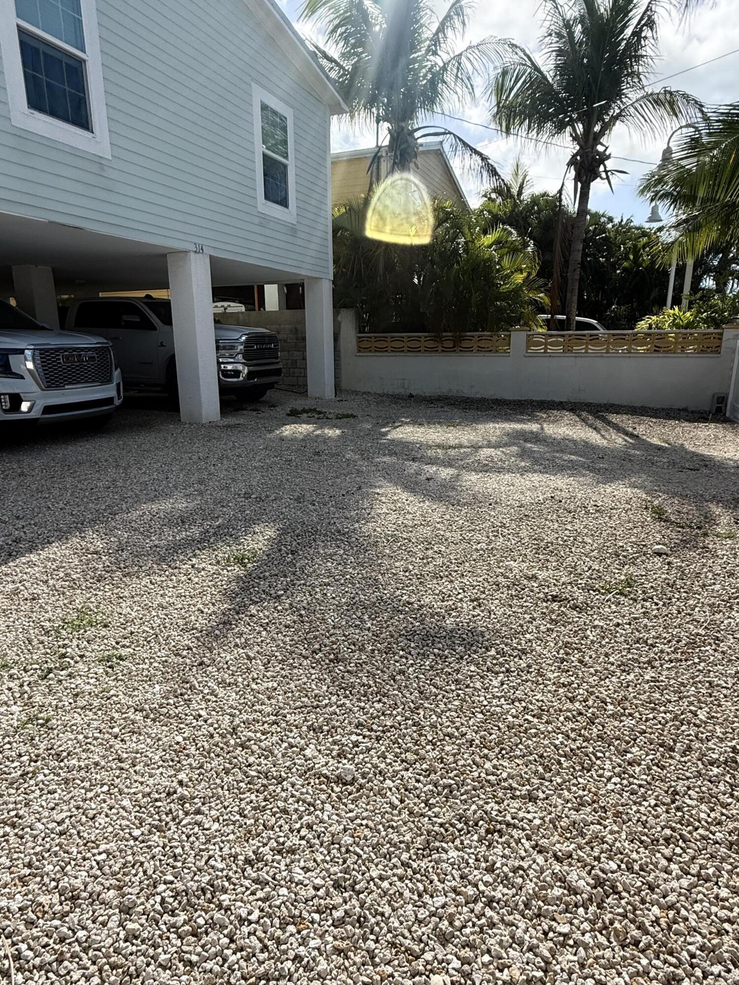 314 Ave D Key West, FL 33040 - Photo 2 of 23 a view of a car garage