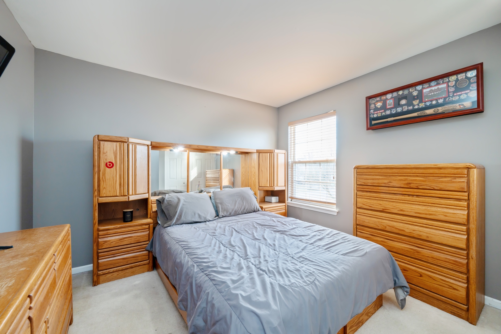 232 Burton Drive Bartlett, IL 60103 - Photo 13 of 20 a bedroom with a bed and a window