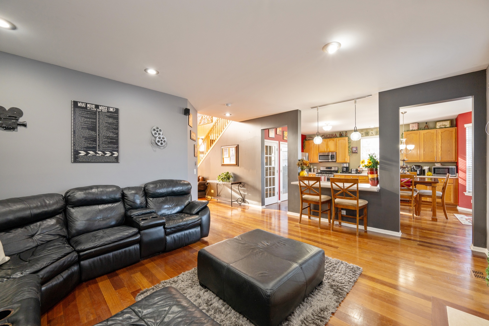 232 Burton Drive Bartlett, IL 60103 - Photo 8 of 20 a living room with furniture and a table