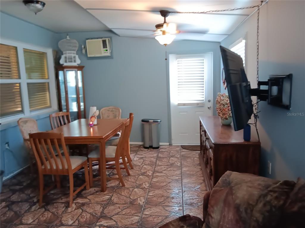 374 3rd Street Northwest Largo, FL 33770 - Photo 18 of 31 a dining room with furniture and window