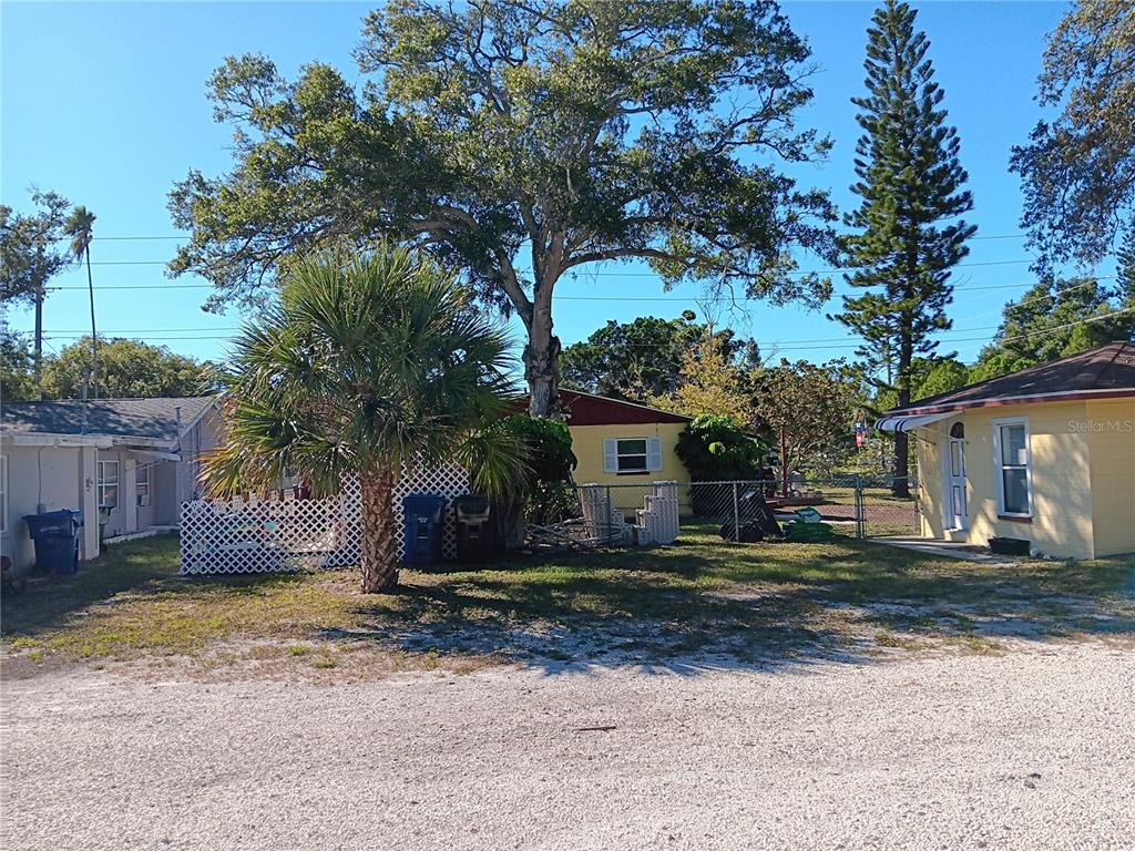 374 3rd Street Northwest Largo, FL 33770 - Photo 22 of 31 a front view of a house with a yard