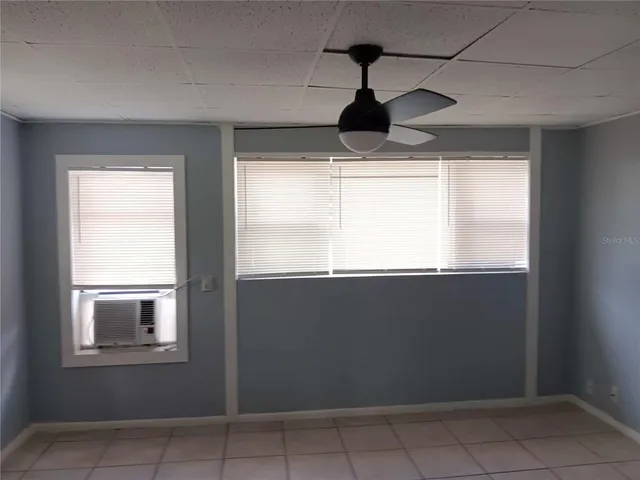 a view of an empty room and window