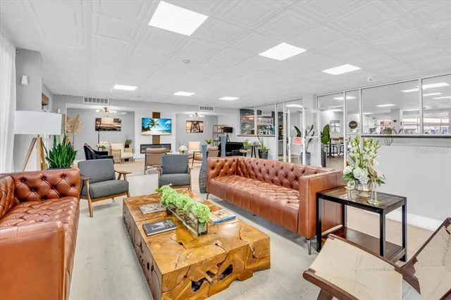 a living room with furniture and a table