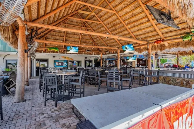 a view of a tables and chairs in patio