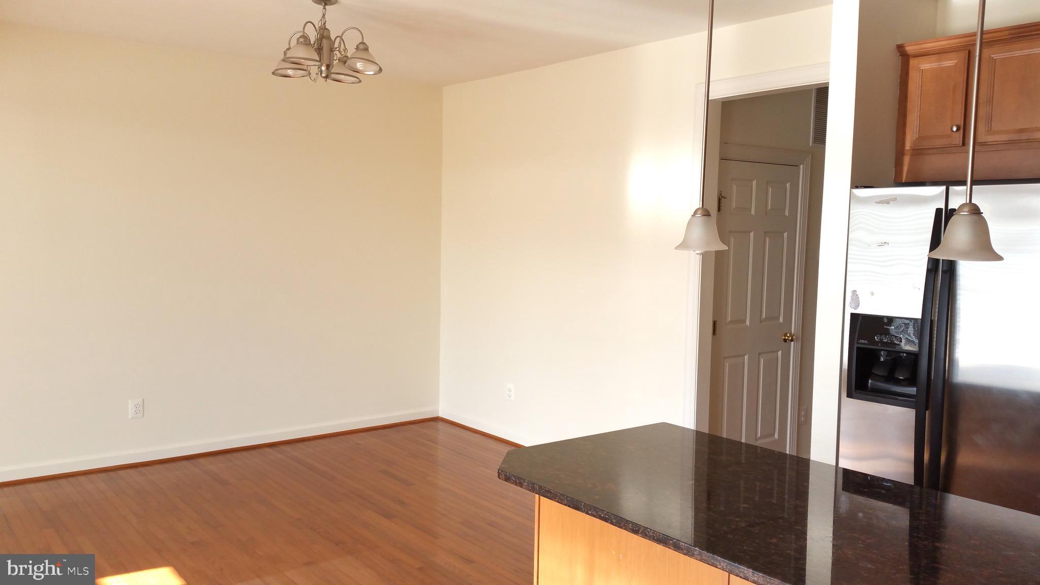 41785 Expectation Square Aldie, VA 20105 - Photo 5 of 21 a view of a bedroom with a hallway