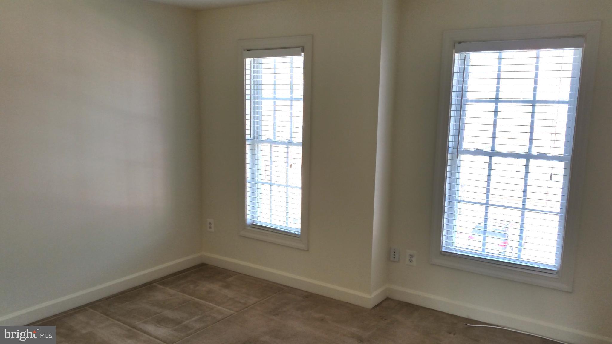 41785 Expectation Square Aldie, VA 20105 - Photo 9 of 21 an empty room with windows