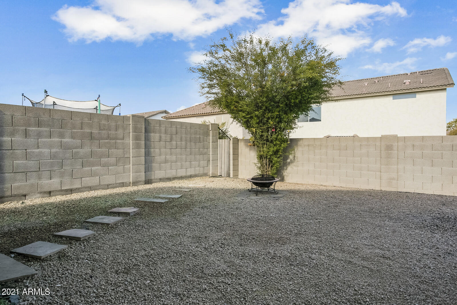 1114 East Fraktur Road Phoenix, AZ 85040 - Photo 21 of 23 a view of a house with a yard and garage