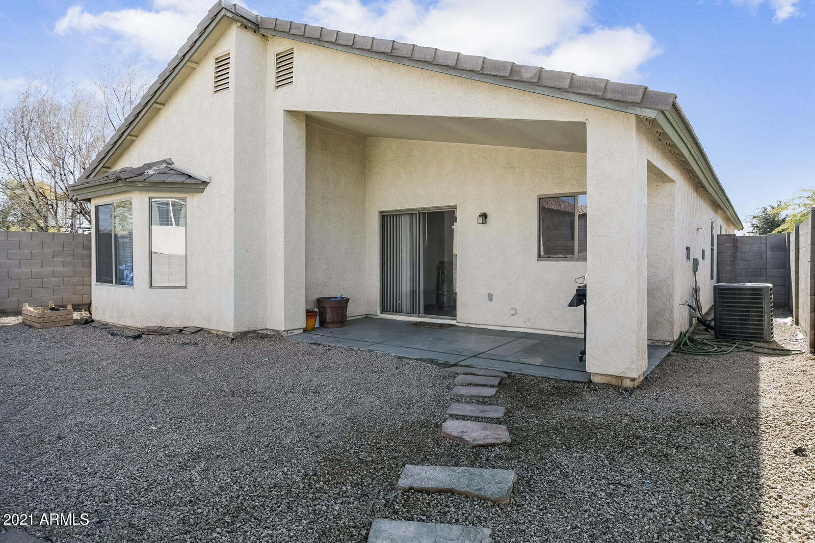 1114 East Fraktur Road Phoenix, AZ 85040 - Photo 22 of 23 a view of a house with a backyard