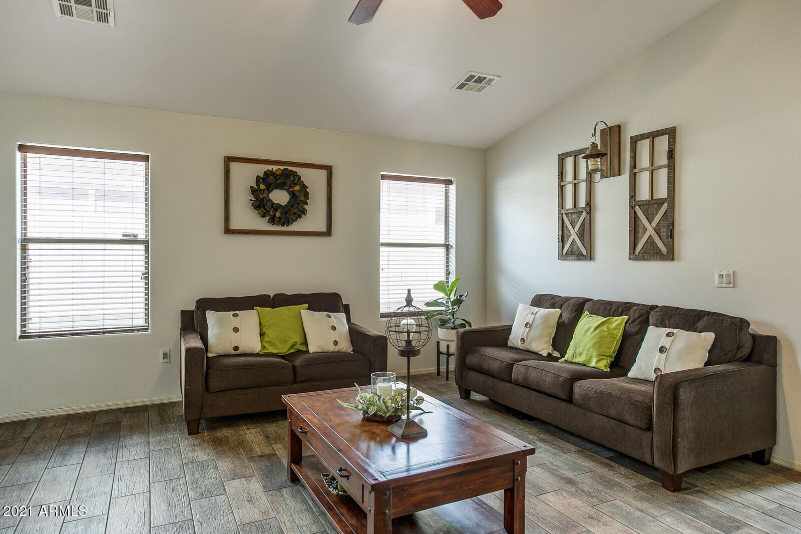 1114 East Fraktur Road Phoenix, AZ 85040 - Photo 5 of 23 a living room with furniture and a window