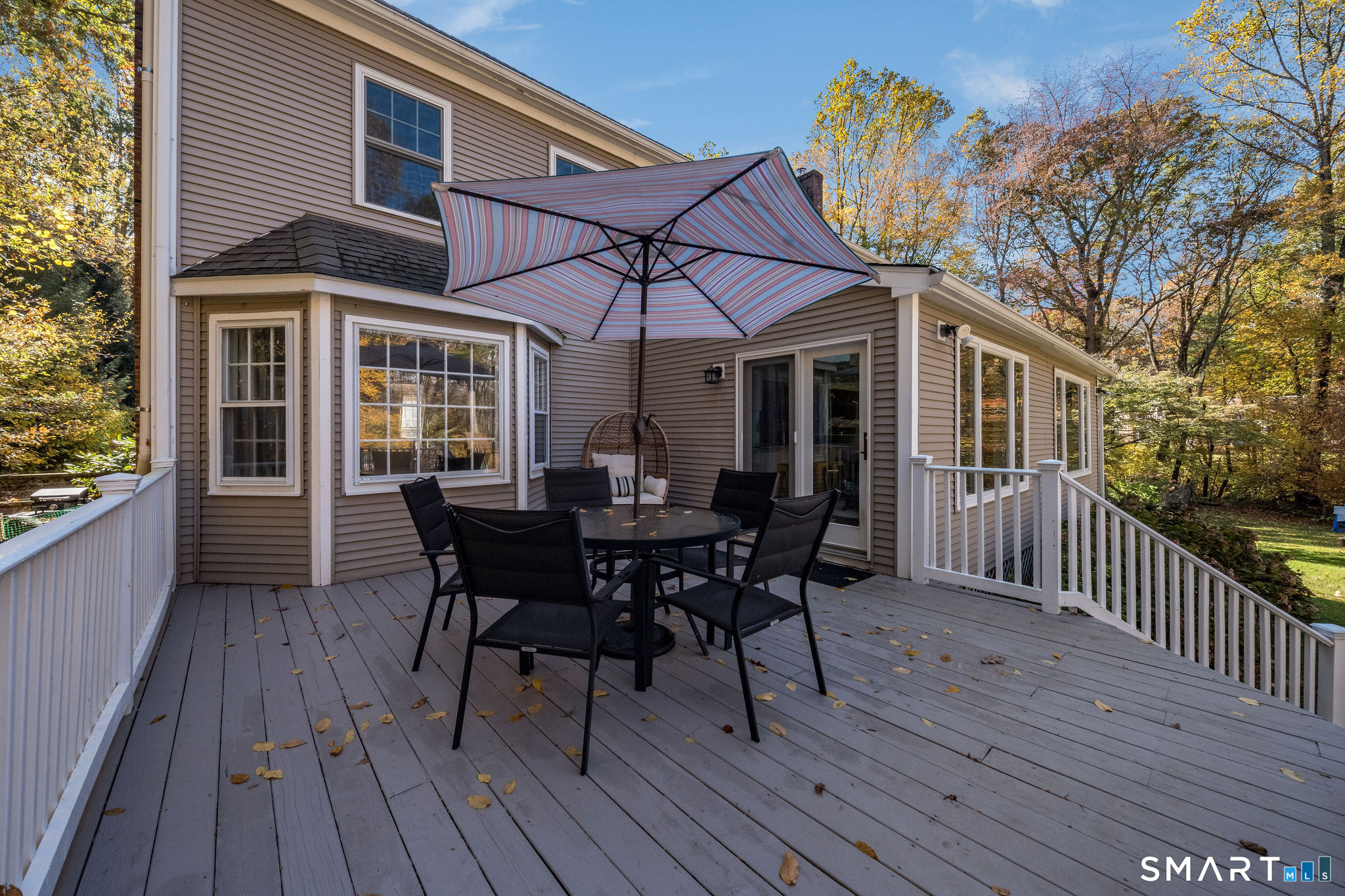 131 Opening Hill Road Madison, CT 06443 - Photo 34 of 40 GREAT back deck off the Kitchen.