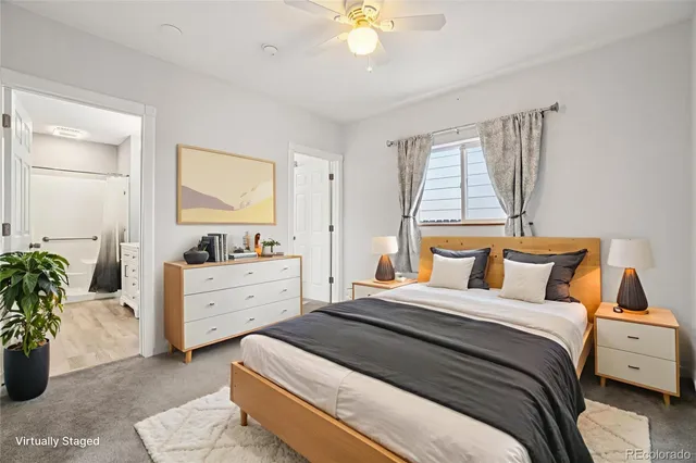 a bedroom with a bed and a dresser