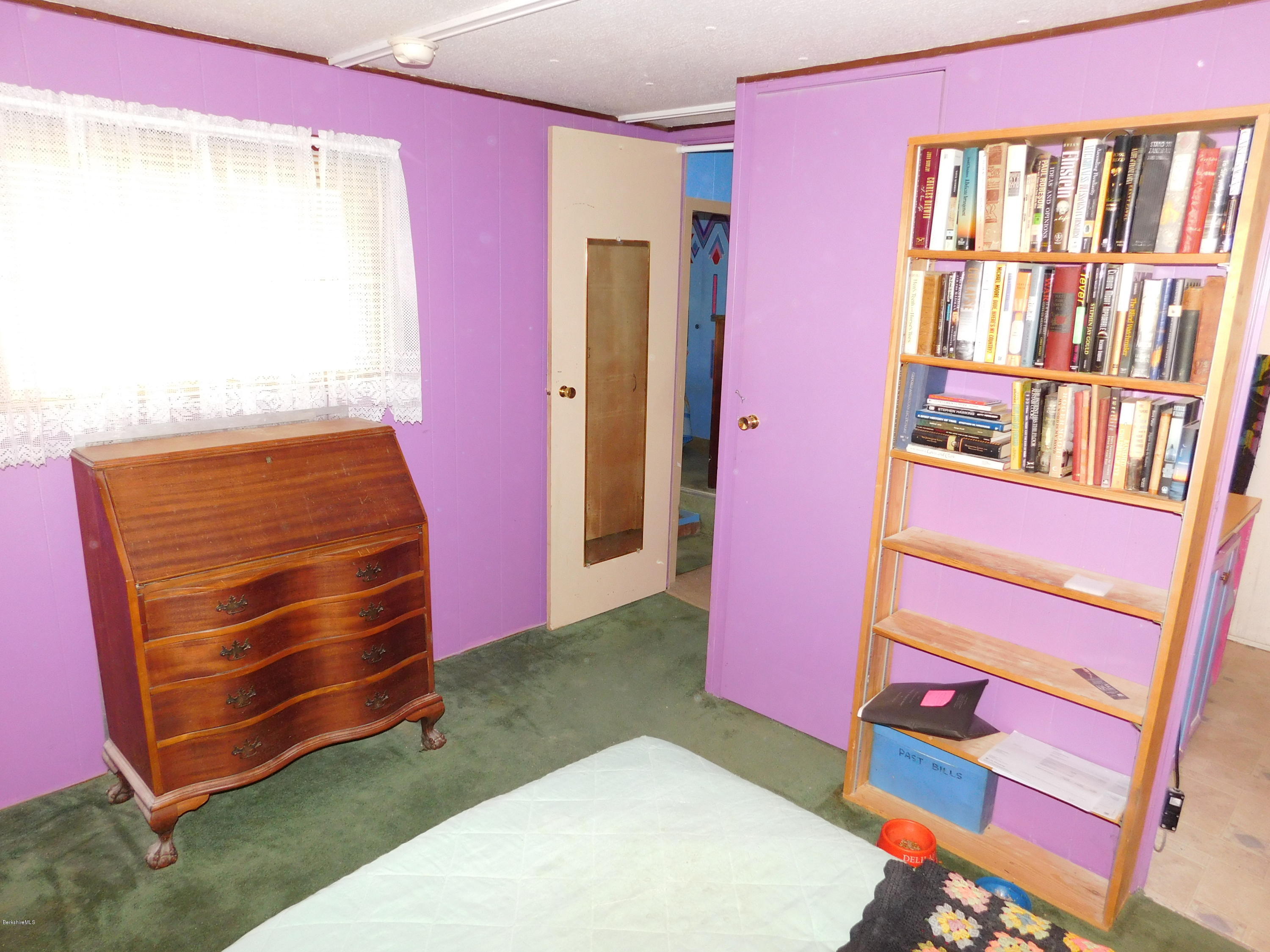 94 River Road Savoy, MA 01256 - Photo 25 of 36 a room with furniture and a window