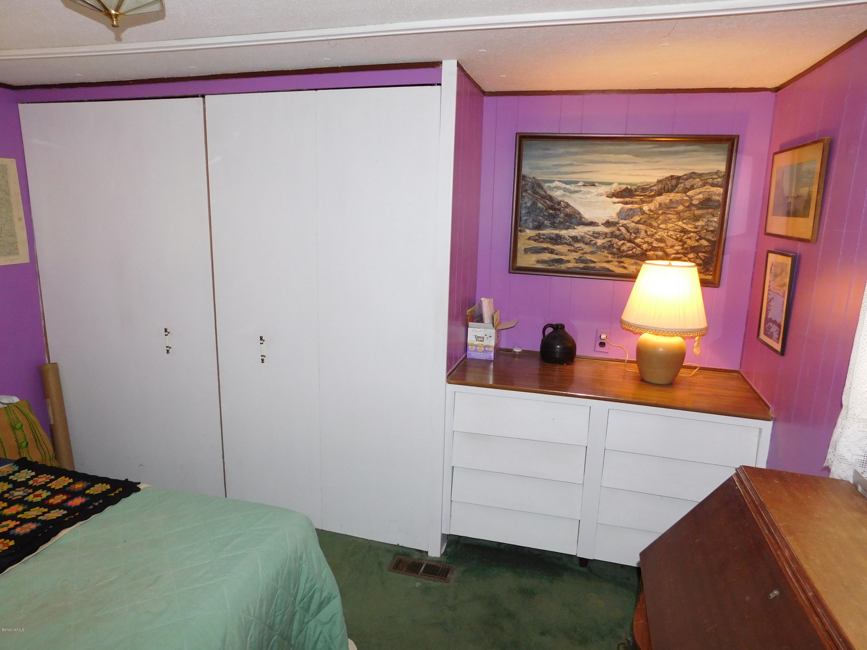 94 River Road Savoy, MA 01256 - Photo 26 of 36 a bedroom with a bed and a window