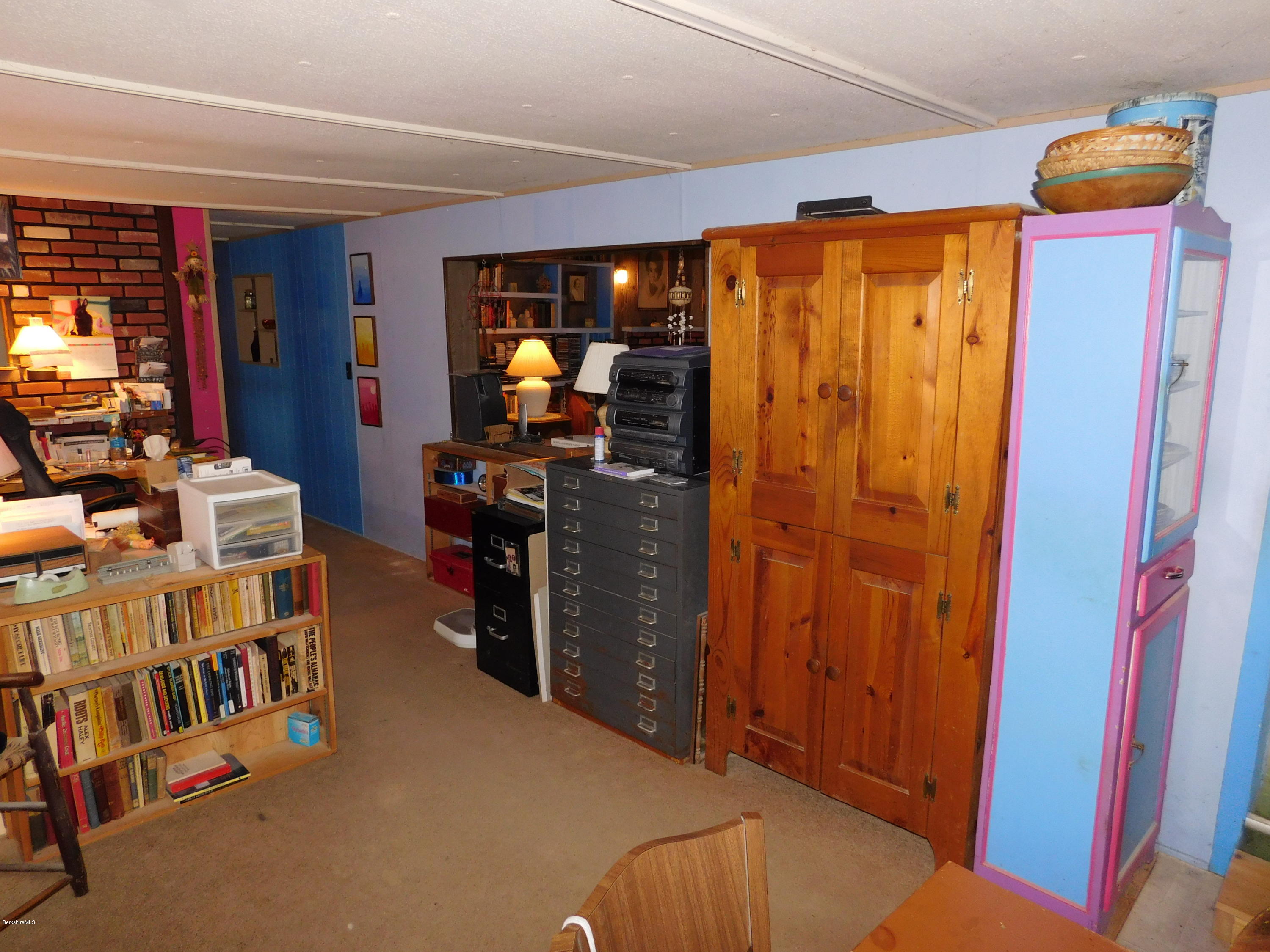 94 River Road Savoy, MA 01256 - Photo 32 of 36 a view of a bedroom with furniture and closet