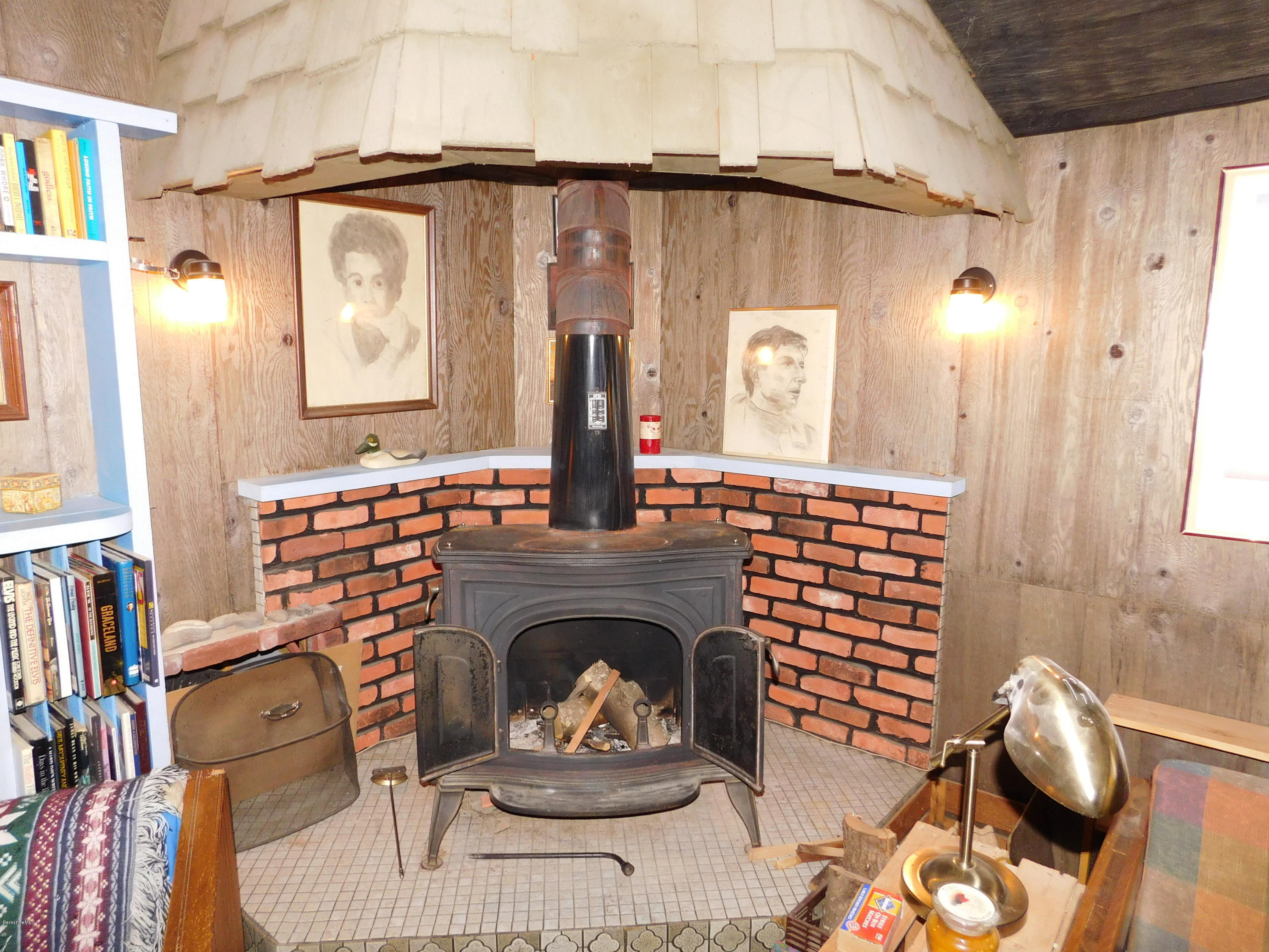 94 River Road Savoy, MA 01256 - Photo 10 of 36 a living room with furniture and a fireplace